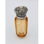 A Sterling Silver vinaigrette style perfume bottle with embossed decoration