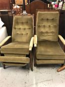 Two Mid Century recliners with built in foot stools
