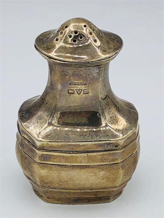 A silver pepper pot, hallmarked Chester.