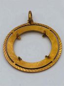 A 9ct gold circular pendant (5.2g)