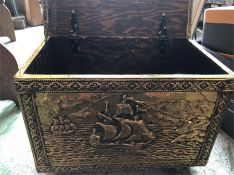A Brass embossed coal box