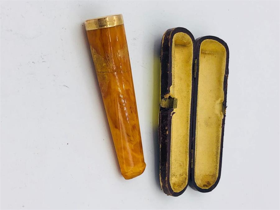 An Amber cigar holder with a 9ct gold mount - Image 2 of 3