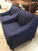 Two dark blue arm chairs