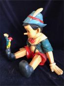 A 1970's figure of Pinocchio and Jiminy Cricket