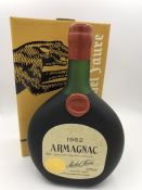 A Bottle of Michel Faure 1962 Armagnac, boxed.