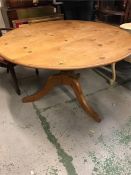 A pine dining table, 4ft diameter.