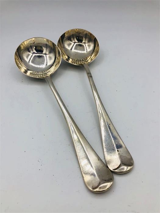 A pair of sauce spoons in silver dated 1905 by WH & Sons Ltd.