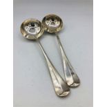 A pair of sauce spoons in silver dated 1905 by WH & Sons Ltd.