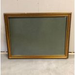 A Large modern gilt frame with Perspex inset.