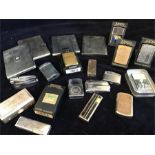 A selection of smoking related items to include lighters and cigarette cases by various makers