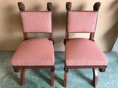 A pair of mid Victorian Renaissance revival carved walnut library side chairs. With lion mask carved