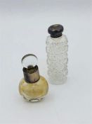 Two silver capped scent bottles
