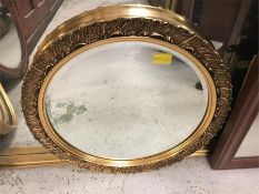 Small round gilt bevelled framed mirror (D49cm)
