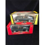 Two Burago Diecast models, boxed Jaguar 'E' Coupe 1961 and an Aston Martin V12 Vanquish