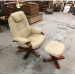 A Cream leather armchair with matching footstool