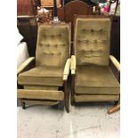 Two Mid Century recliners with built in foot stools