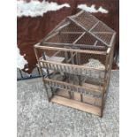 A wooden decorative bird cage