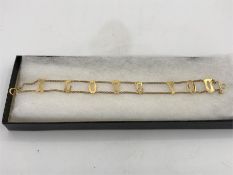 A 9ct yellow gold 'Love you' bracelet 5g