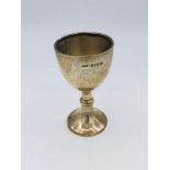 A small silver goblet, hallmarked for Birmingham 1913, makers mark TS.