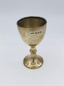 A small silver goblet, hallmarked for Birmingham 1913, makers mark TS.