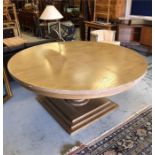 A Large round pedestal dining table on a large square base in light oak, 180 cm diameter.