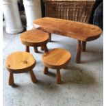 A Rustic wooden set of three stools and bench or table