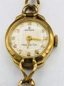 A Ladies gold Rolex watch