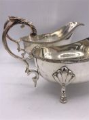 A pair of silver plated sauce boats