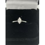 A 9ct white gold Marquoise single stone diamond ring