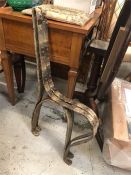 Two plain iron bench ends
