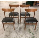 A set of four dining chairs in teak and black faux leather by Schionning & Elgaard, original 1960'