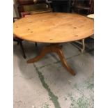 A pine dining table, 4ft diameter.