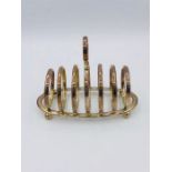 A White metal toast rack