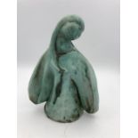 A pottery angel in green by Indian Artist Gulbanoo McGee, when based in Bombay.
