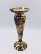 A silver vase, hallmarked Birmingham 1907.