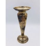 A silver vase, hallmarked Birmingham 1907.