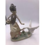 Lladro Figure of a Goose chasing Girl with Basket (22cm)