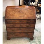 A Mahogany four draw bureau