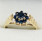 9ct gold with blue sapphire ring