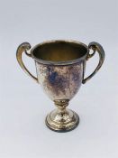 A small, hallmarked silver trophy
