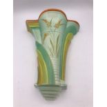 A Burliegh ware wall sconce, green grounds.