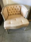 A French style Salon chair with reeded legs and button back detail.