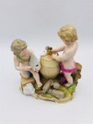 Meissen figures of two cherubs.