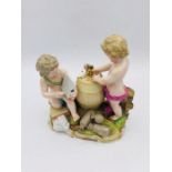 Meissen figures of two cherubs.