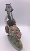Lladro figure Girl with wheelbarrow of flowers (26cm)