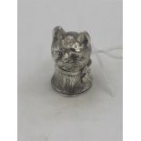 A solid silver vesta in the form of a cat.