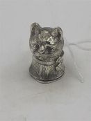 A solid silver vesta in the form of a cat.
