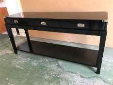 A Three draw lacquered console table with chrome drop handles by EICHHOLTZ