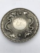 A Chinese white metal coin tray