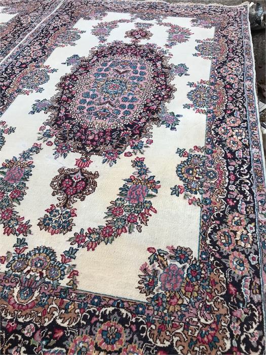 A Pair of cream ground rugs with floral borders 223cm x 128cm - Image 6 of 6